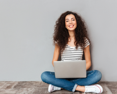 Portrait,Of,Satisfied,Female,With,Beautiful,Smile,Enjoying,Watching,Movie