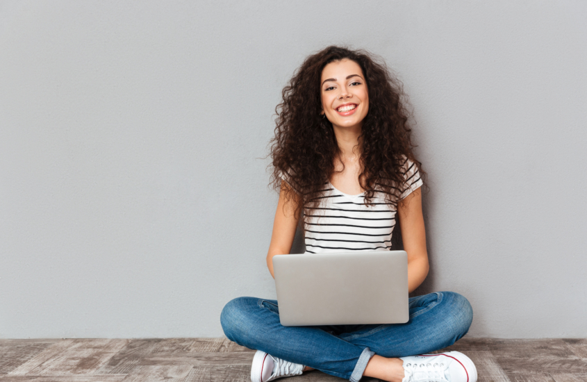 Portrait,Of,Satisfied,Female,With,Beautiful,Smile,Enjoying,Watching,Movie