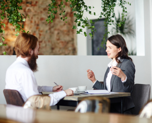 Interview tips woman and man in office