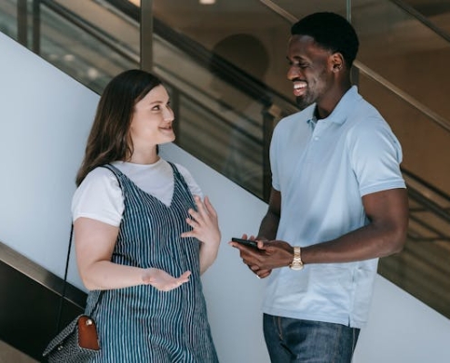 Two people talking elevator pitch